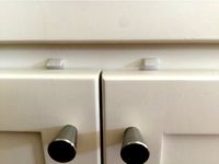 Pushbutton Child Safety Latch for Cabinets by jbramel