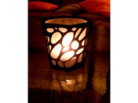 Organic shaped candle holder by Robbel