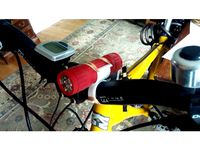 Bracket to attach torch to handlebars by Glyn