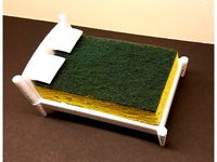 Sponge Bed with Pillows by CaptObvious