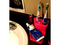 Toothbrush/hairclip/tooth-paste (and electric brush spot)/random holder for side of oval sink. by Gremble