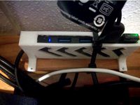 Wall mount for USB3 hub Amazon Basic by Keugon