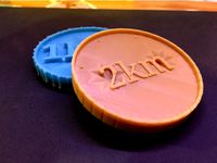 2 Kilometer Token by patricknevindwyer