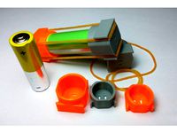 Rubber Band Battery Holder by PlastiMaker