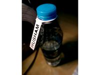 Bottle Label by hushamsamir