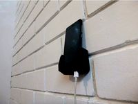 Xiaomi Redmi 2 wall holder by SebastianGNU