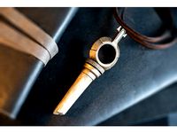 Disnorored 2 Bone charm by Avduevsky