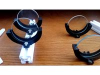 Freestanding or T-slot lens holder for 50mm lenses  by econopotamus