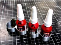 Loctite small bottle holder by NearFarMedia