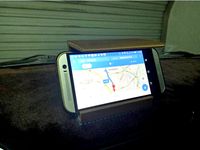 Mobile phone holder with sun visor by Gilin