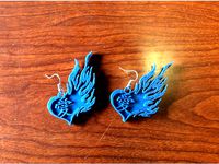 FIre heart earring by SushiSlices