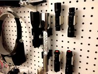 Pegboard flashlight holder  by 5hp