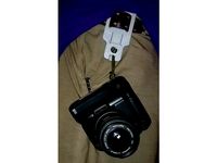 Quick release camera clip/holster (work in progress) by shoddyunicorn