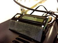 16x2 LCD Stand with Button by coddingtonbear