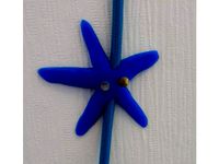 Starfish cable holder (clip) with nails as eyes by tprime