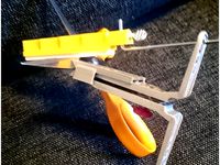 Scissors holder for Lansky type knife sharpening system by jpnurro