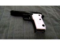 Helwan Cal 9 grips. by AeonicEntity
