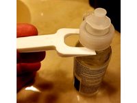 Contact Lens Solution Bottle Cap Pry Tool by hanselcj