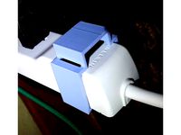 Powerstrip rocker switch protector by Sophicles