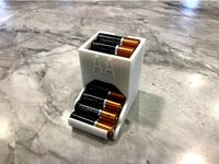 Nice Looking and Compact Tabletop AA Battery Holder by coolmandude545