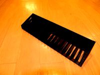 Yet another DVD/CD/game rack by arpruss