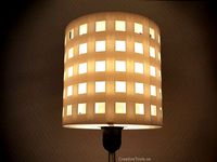 3D-printable lampshade for standard light fixture (concentric perforated shading walls) by CreativeTools