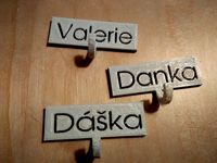 Create a name tag with a small hook for keys by rklauco