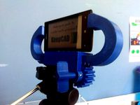 Suporte para uso de celular em um tripé de câmera digital by keepcaddotmaker