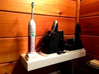 Electric Razor Charger Holder for shelf by HunterGreen