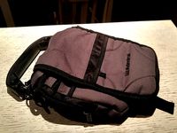 Vertical messenger bag carrying handle by coopep