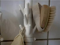 Towel hook, snaps onto waterpipe by Peter_Lundholm_Jensen