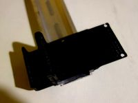 DIN rail mount for 60x40mm PCB by paulkennett