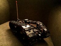 Servo driven tracked rover w/suspensions (self tightning belts).   by lynlim