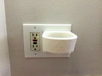 Wall mounted hairdryer holder  by rubb3rtoe