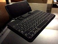 Stand for Logitech Keys to Go & iPhone (with Spigen Case) by Jamesdavid