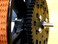 Gear pair to drive AndyMark Placation wheels from Pitsco Tetrix hubs by benmcl