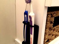 Wall-Mounted Dual Toothbrush Holder by alexberkowitz