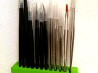 Tweezers wall mount by Pakue