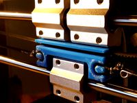 X- Axis Belt Mounting Bracket (Cocoon Create, Wanhao Di3 v2, etc.) by PlasticCow