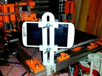 Universal phone/webcam holder to stream the printing progress. by dexterko