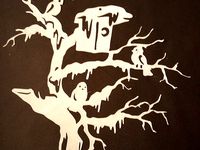 Birdhouse in tree by tigerklaue