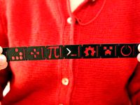 Nerdy Logo Bracelet by scarabaea