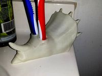 Tricerabrush - toothbrush holder by derben