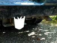 Decepticon and Autobot trailer hitch covers by Kcobbler
