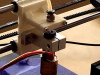 QUBD : Bowden style x-carriage with hot-end metal holder by Tony_921