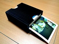 Polaroid photo storage box by jiashian