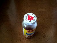 Vitamin bottle cap with day arrow by mayoff