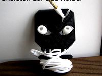 Skeleton Ear-Bud Holder by JackJ106