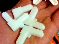 Corner pieces for window screen frames. by mcscoder