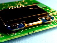 Mounting tabs for 1.3" OLED display by zapta